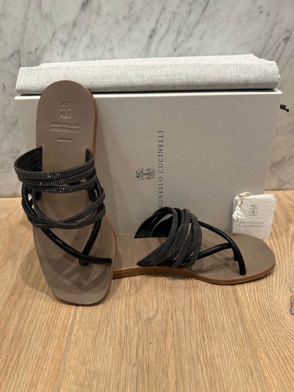Brunello Cucinelli Monili Trimmed Black Leather Toe Loop Sandals